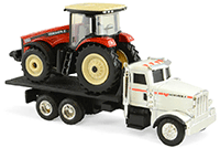 Show product details for Tomy ERTL Versatile - 290 MFWD Tractor on Peterbilt 367 Dealership Truck (1/64 scale diecast model car, Red & White) 16247