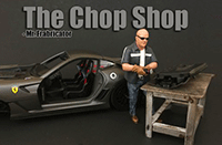 Show product details for American Diorama Figurine - The Chop Shop Mr. Fabricator Figure (1/18  scale, Black/Brown) 38160