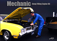 Show product details for American Diorama Figurine - Mechanic | Doug Filling Engine Oil (1/18 scale, Blue) 77449 